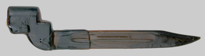 Image of British No. 9 Mk. I bayonet in wrapper with hard wax coating