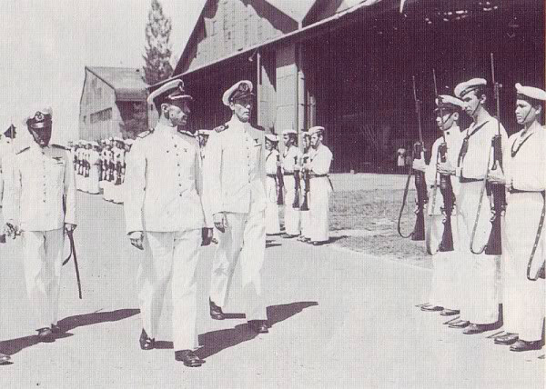 Image of Dutch naval honor guard armed with the Johnson Model 1941 rifle at an airfield